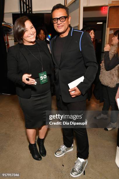 Designer Naeem Khan and a guest pose backstage for Naeem Khan during New York Fashion Week: The Shows at Gallery I at Spring Studios on February 13,...