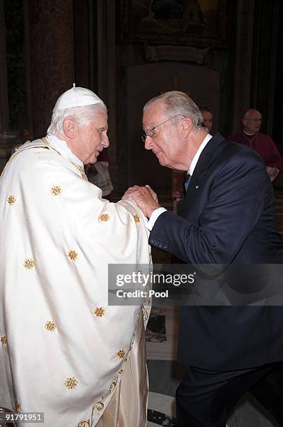 Pope Benedict XVI meets King Albert II of Belgium at the end of a canonisation ceremony at St Peter's Basilica on October 11, 2009 in Vatican City,...