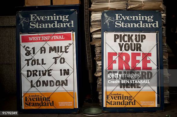 London Evening Standard board reading 'Pick Up Your Fress Standard Here' is seen in central London on October 12, 2009. London's Evening Standard on...