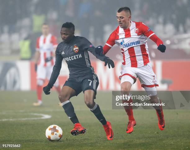 Ahmed Musa of CSKA Moscow in action against Nenad Krsticic of Crvena Zvezda during the UEFA Europa League Round of 32 match between Crvena Zvezda...