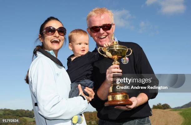 Personality Chris Evans, his wife Natasha and son Noah pose with the Ryder Cup after the 'Year to Go' exhibition match on the Twenty Ten Course at...