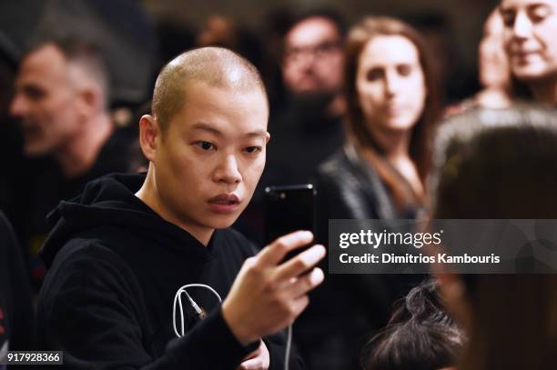 Designer Jason Wu poses backstage for BOSS Womenswear during New York Fashion Week at Cedar Lake on February 13, 2018 in New York City.