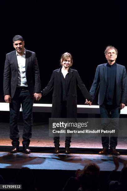 Autor of the Piece, Rachid Benzine, actors of the Piece; Lou de Laage and Charles Berling acknowledge the applause of the audience at the end of the...