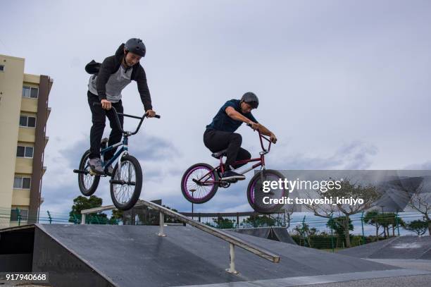 bmx rider,japan,okinawa - bmx freestyle stock pictures, royalty-free photos & images