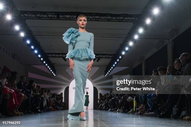 Model walks the runway at Chiara Boni La Petite Robe show during New York Fashion Week at Gallery II at Spring Studios on February 13, 2018 in New...