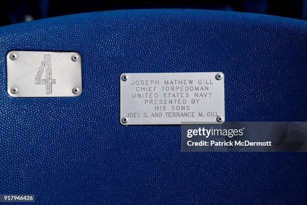 Detail view of a chair back memorial plate during a tour of the Navy-Marine Corps Memorial Stadium, the site of the 2018 Coors Light NHL Sadium...