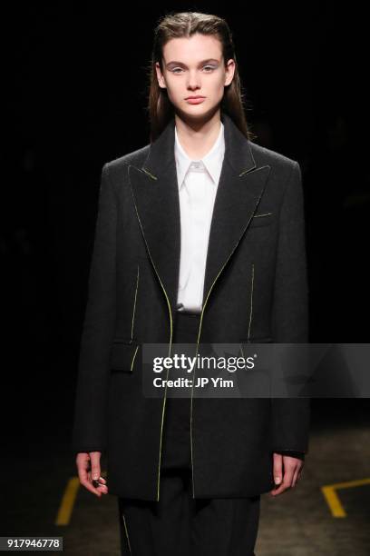 Model walks during BOSS Womenswear Gallery Collection During New York Fashion Week Mens' at Cedar Lake on February 13, 2018 in New York City.