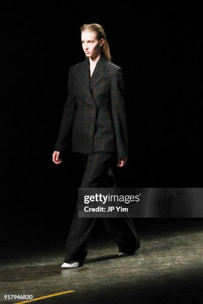 Model walks during BOSS Womenswear Gallery Collection During New York Fashion Week Mens' at Cedar Lake on February 13, 2018 in New York City.