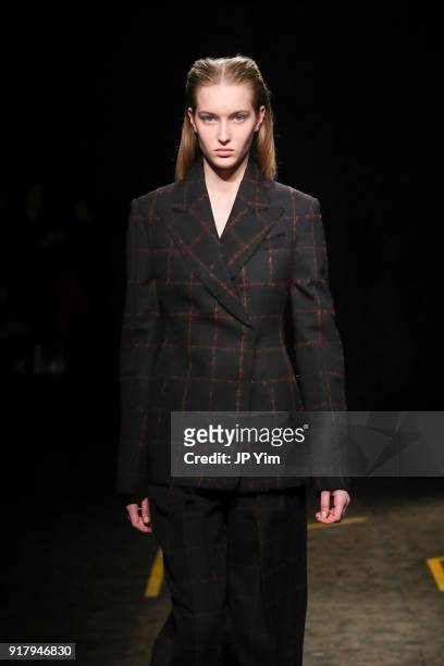 Model walks during BOSS Womenswear Gallery Collection During New York Fashion Week Mens' at Cedar Lake on February 13, 2018 in New York City.
