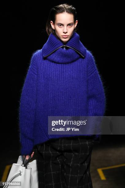 Model walks during BOSS Womenswear Gallery Collection During New York Fashion Week Mens' at Cedar Lake on February 13, 2018 in New York City.