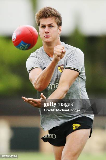 Daniel Howe of the Hawks handballs during a Hawthorn Hawks AFL training session on February 14, 2018 in Melbourne, Australia.