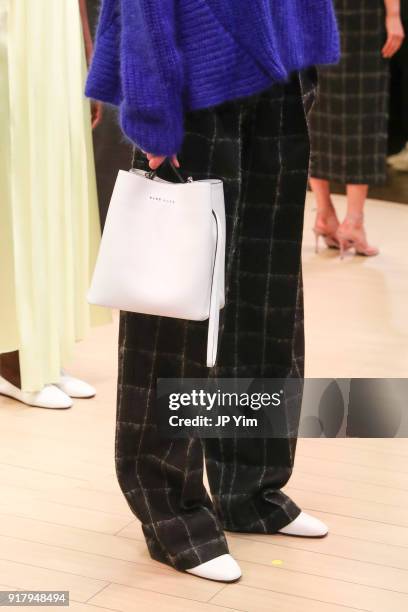 Models pose during BOSS Womenswear Gallery Collection During New York Fashion Week Mens' at Cedar Lake on February 13, 2018 in New York City.