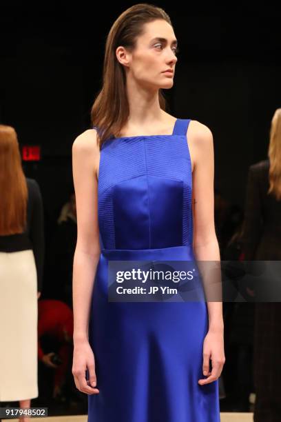 Models pose during BOSS Womenswear Gallery Collection During New York Fashion Week Mens' at Cedar Lake on February 13, 2018 in New York City.