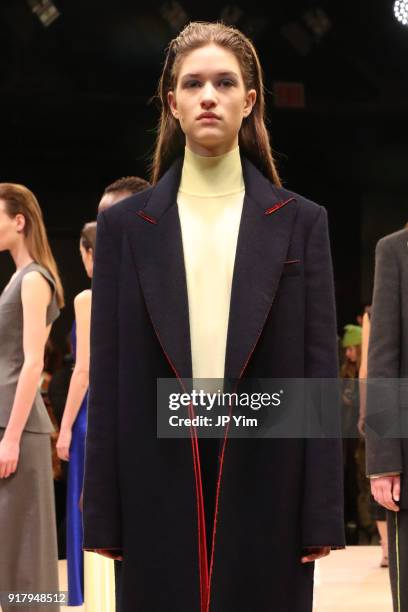 Models pose during BOSS Womenswear Gallery Collection During New York Fashion Week Mens' at Cedar Lake on February 13, 2018 in New York City.