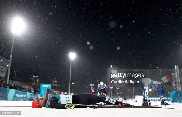 Thomas Bing of Germany lays on the snow during the Cross-Country Men's Sprint Classic Quarterfinal on day four of the PyeongChang 2018 Winter Olympic...