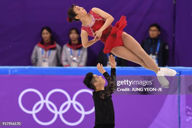 South Korea's Kim Kyueun and South Korea's Alex Kang Chan Kam compete in the pair skating short program of the figure skating event during the...