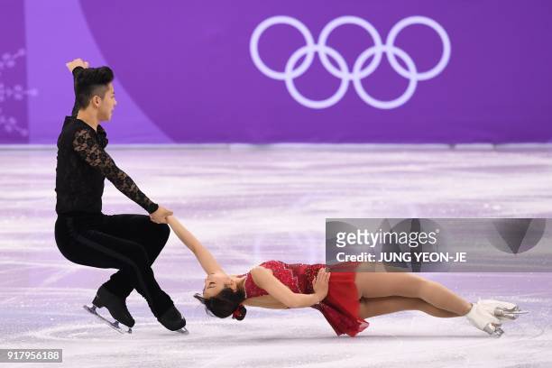 South Korea's Kim Kyueun and South Korea's Alex Kang Chan Kam compete in the pair skating short program of the figure skating event during the...
