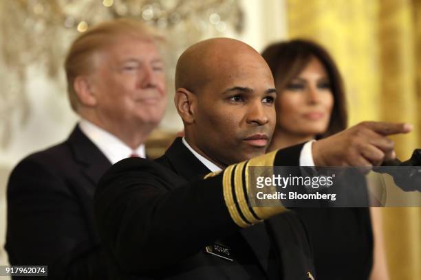 Vice Admiral Jerome Adams, the U.S. Surgeon General, gestures while speaking at an event with U.S. President Donald Trump and First Lady Melania...