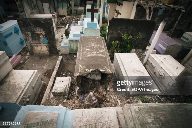 Broken grave seen at the cemetery. In the center of Pasay District of Metro Manila is a cemetery where over 10,000 deceased people is resting in...