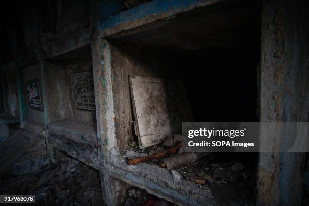 Grave seen broken into and the coffin and body is missing. In the center of Pasay District of Metro Manila is a cemetery where over 10,000 deceased...