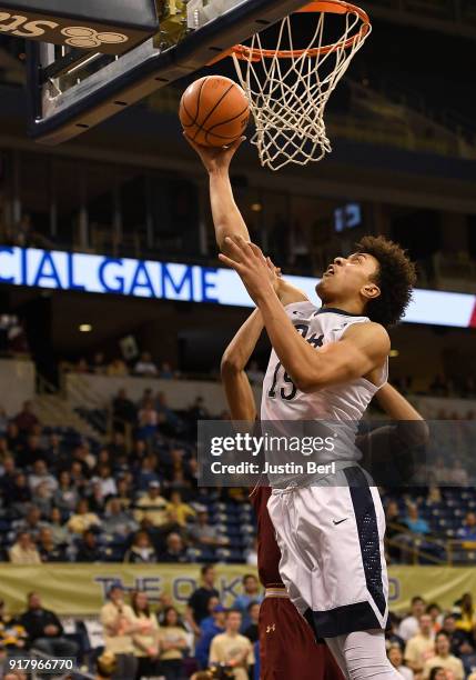Kene Chukwuka of the Pittsburgh Panthers goes to the basket for a lay up in the first half during the game against the Boston College Eagles at...
