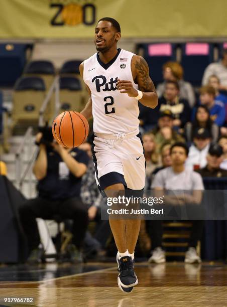 Jonathan Milligan of the Pittsburgh Panthers brings the ball up court in the first half during the game against the Boston College Eagles at Petersen...