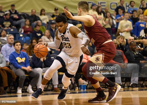 Shamiel Stevenson of the Pittsburgh Panthers dribbles against Luka Kraljevic of the Boston College Eagles in the first half during the game at...