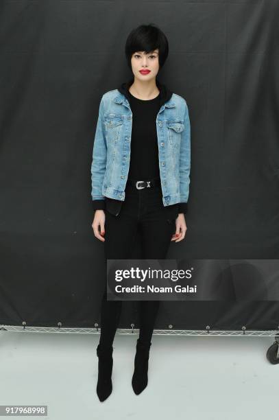 Model poses backstage for Zang Toi during New York Fashion Week: The Shows at Pier 59 on February 13, 2018 in New York City.