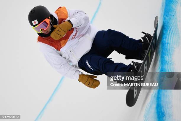 Japan's Ayumu Hirano competes during run 2 of the final of the men's snowboard halfpipe at the Phoenix Park during the Pyeongchang 2018 Winter...