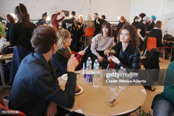 Models wait backstage at the Calvin Luo fashion show during New York Fashion Week on February 13, 2018 in New York City.