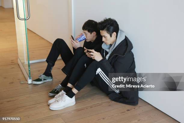 Models wait backstage at the Calvin Luo fashion show during New York Fashion Week on February 13, 2018 in New York City.