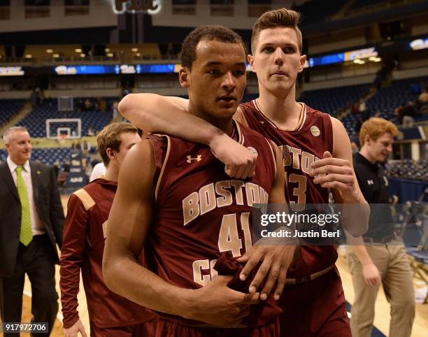 Steffon Mitchell of the Boston College Eagles walks off the court with Luka Kraljevic at the conclusion of the Boston College Eagles 81-58 win over...