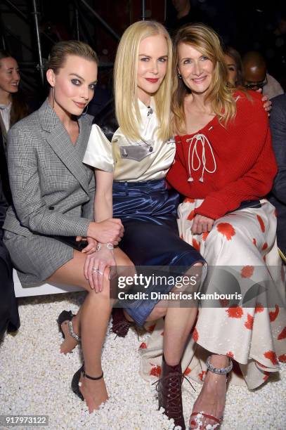 Actors Margot Robbie, Nicole Kidman, and Laura Dern attend the Calvin Klein Collection front row during New York Fashion Week at New York Stock...