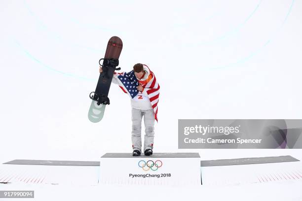 Gold medalist Shaun White of the United States poses during the victory ceremony for the Snowboard Men's Halfpipe Final on day five of the...