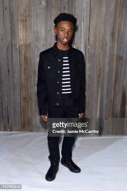 Actor Alex Hibbert attends the Calvin Klein Collection during New York Fashion Week at New York Stock Exchange on February 13, 2018 in New York City.