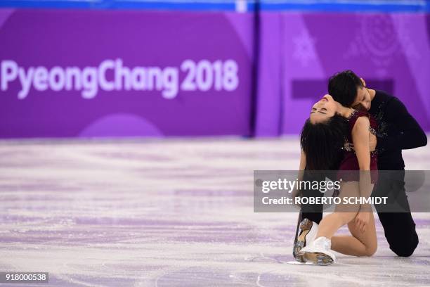 China's Sui Wenjing and China's Han Cong compete in the pair skating short program of the figure skating event during the Pyeongchang 2018 Winter...