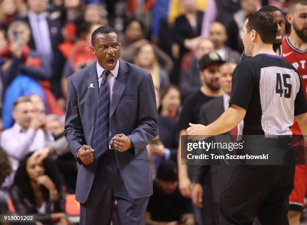 Head coach Dwane Casey of the Toronto Raptors reacts to a call by referee Brian Forte against the Miami Heat at Air Canada Centre on February 13,...