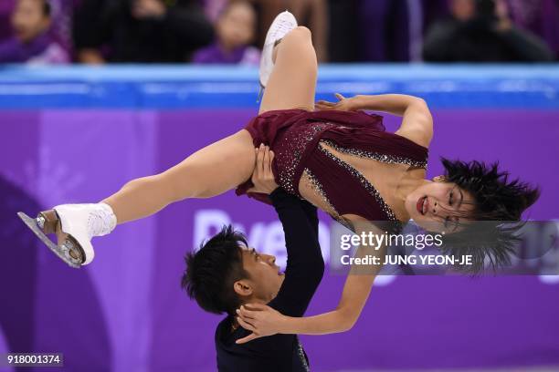 China's Sui Wenjing and China's Han Cong compete in the pair skating short program of the figure skating event during the Pyeongchang 2018 Winter...