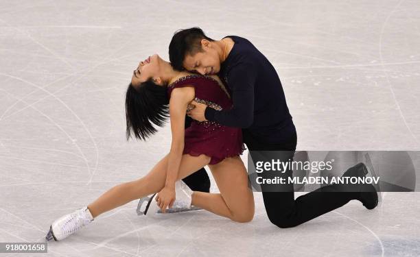 China's Sui Wenjing and China's Han Cong compete in the pair skating short program of the figure skating event during the Pyeongchang 2018 Winter...