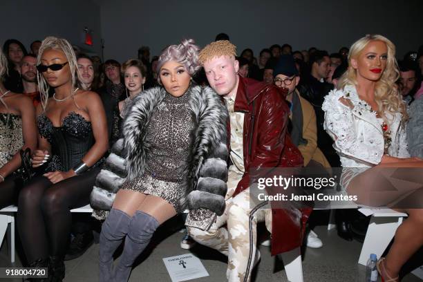 Lil Kim and Shaun Ross attend the front row during New York Fashion Week: The Shows at Gallery I at Spring Studios on February 13, 2018 in New York...