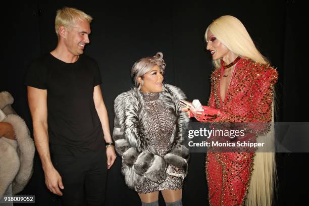 Designer David Blonde, Lil' Kim, and designer Phillippe Blonde pose backstage for The Blonds during New York Fashion Week: The Shows at Gallery I at...