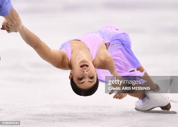 Russia's Natalia Zabiiako and Russia's Alexander Enbert compete in the pair skating short program of the figure skating event during the Pyeongchang...