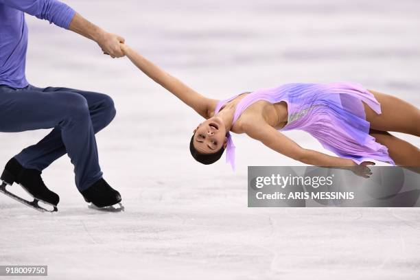 Russia's Natalia Zabiiako and Russia's Alexander Enbert compete in the pair skating short program of the figure skating event during the Pyeongchang...