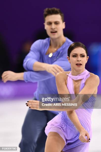 Russia's Natalia Zabiiako and Russia's Alexander Enbert compete in the pair skating short program of the figure skating event during the Pyeongchang...
