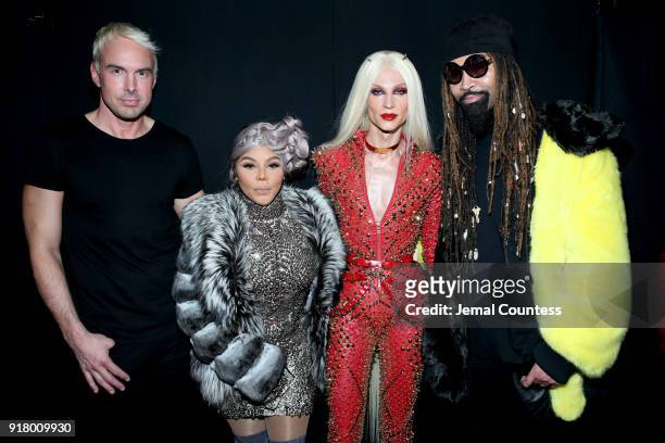 Designer David Blond, Lil' Kim, Designer Phillipe Blond, and Ty Hunter attend The Blonds front row during New York Fashion Week: The Shows at Gallery...