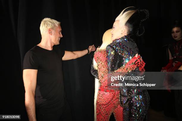 Designers David Blond and Phillipe Blond and art collector Daphne Guiness pose backstage for The Blonds during New York Fashion Week: The Shows at...