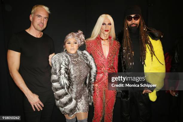 Designer David Blond, Lil' Kim, designer Philip Blond, and stylist Ty Hunter pose backstage for The Blonds during New York Fashion Week: The Shows at...