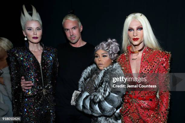 Art Collector Daphne Guiness, Designer David Blond, Lil' Kim, and Designer Phillipe Blond attends The Blonds front row during New York Fashion Week:...