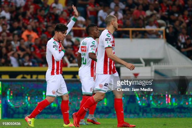Martin Barragan of Necaxa celebrates with teammates after scoring the first goal of his team during the 7th round match between Atlas and Necaxa as...