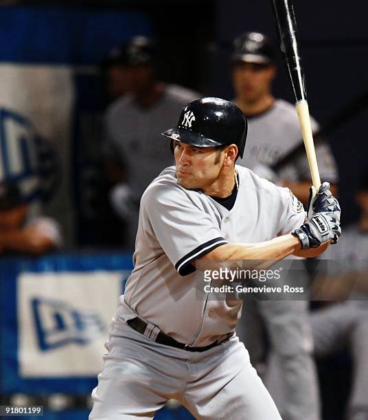 Johnny Damon of the New York Yankees bats against the Minnesota Twins in Game Three of the ALDS during the 2009 MLB Playoffs at the Hubert H....